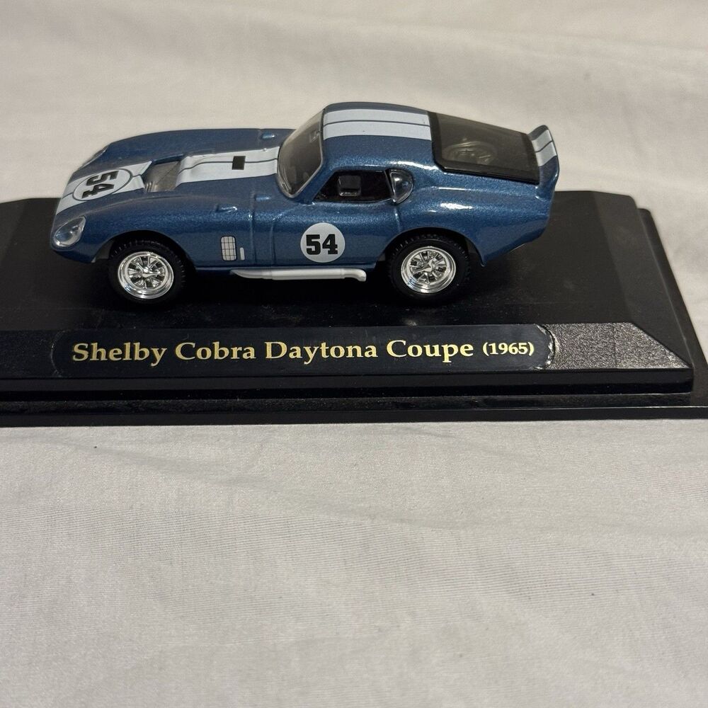 Shelby Cobra Daytona Coupe 1965 #54 Blue/White Diecast Model Car Display Base
